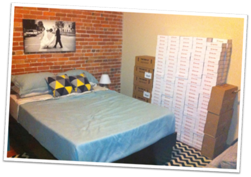 Early Bulu Box inventory stacked in a bedroom