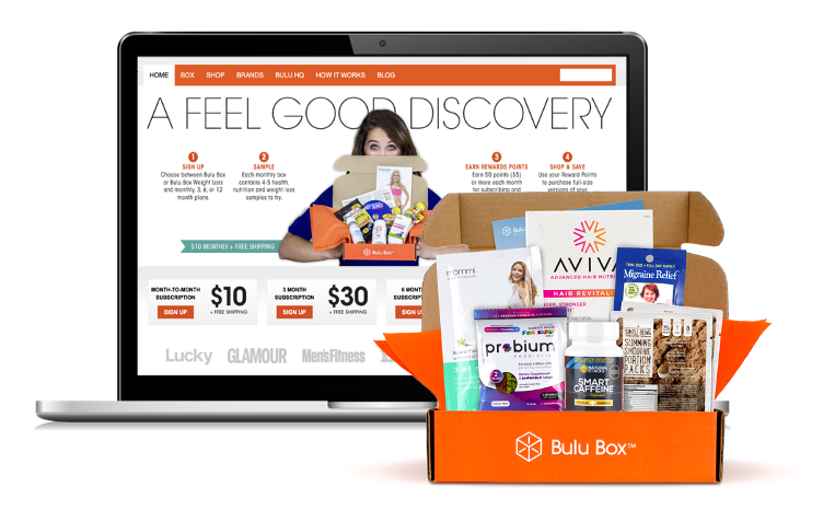 A Bulu Box subscription box in front of the Bulu Box website